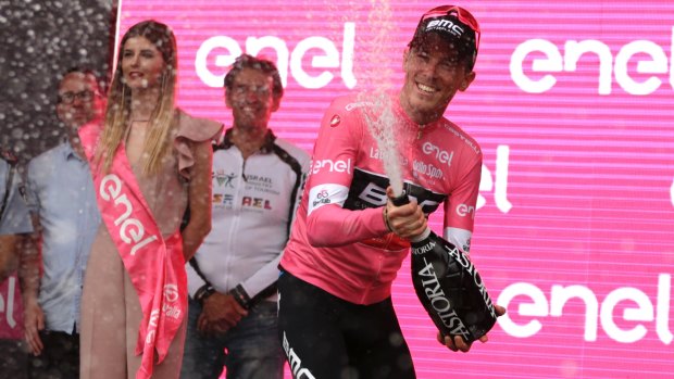 Rohan Dennis celebrates holding the lead overall in the Giro d'Italia.