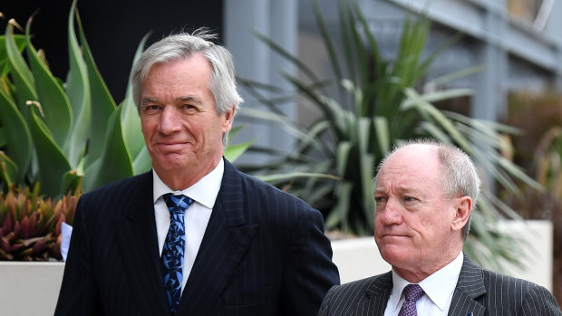 Bruce Hodgkinson SC (right) and James Bell QC, lawyers for Ardent Leisure, arrive for the inquest into the Dreamworld disaster at the Magistrates Court at Southport in June.