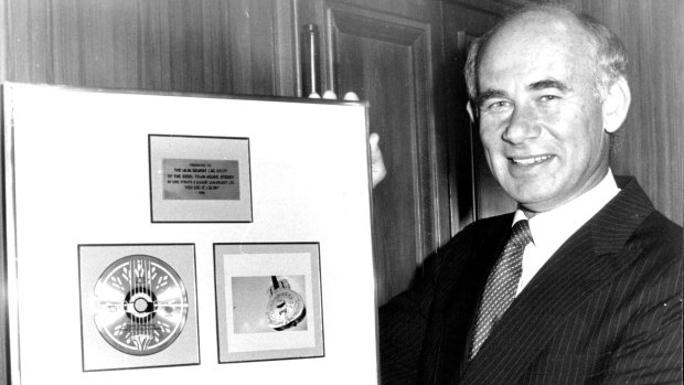 Sebel Town House general manager Michael Hall with a plaque presented to the hotel by the Dire Straits in June, 1984. 