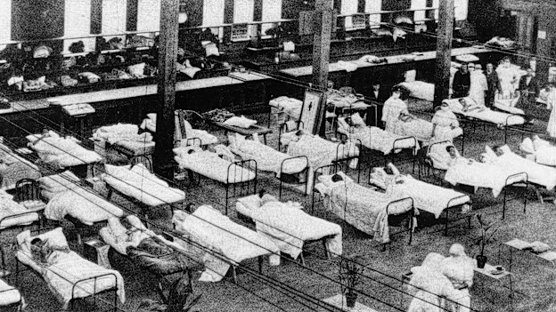 Hospital beds in the Great Hall of the Exhibition Building during the Spanish flu pandemic.