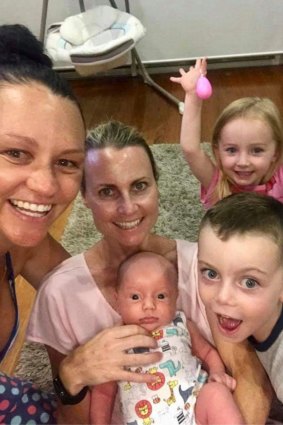 Casey Dellacqua with her partner Amanda and their three children.