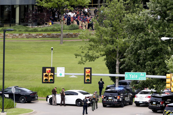 Tulsa police and firefighters respond to the shooting at the hospital complex.