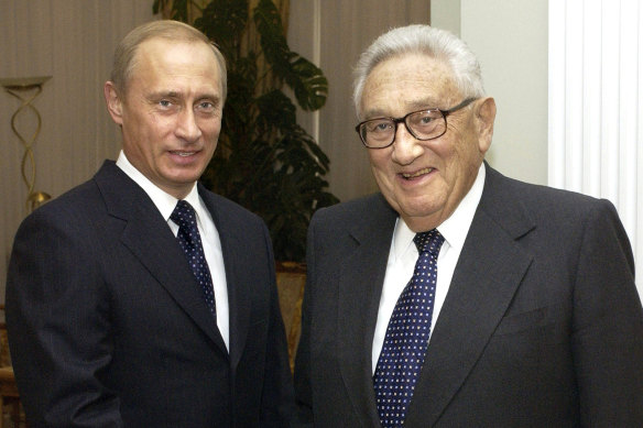 Henry Kissinger with Russian President Vladimir Putin in 2004.