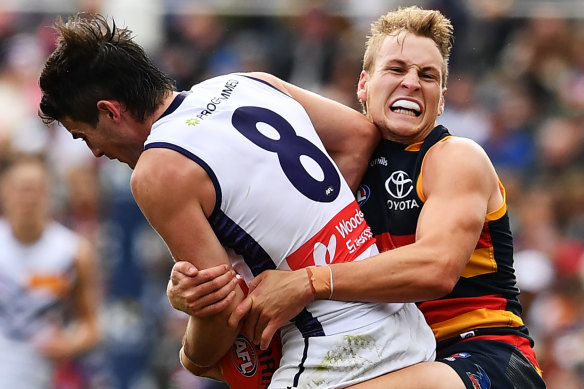 Andrew Brayshaw is tackled by Jordan Dawson