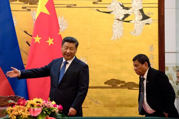 Former Philippine President Rodrigo Duterte, right, with Chinese President Xi Jinping in 2016.
