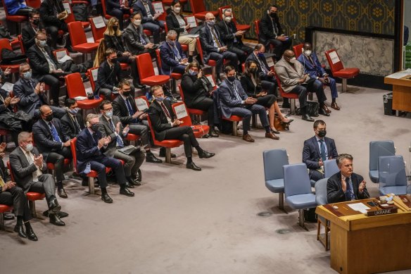 Ukrainian Ambassador to the United Nations Sergiy Kyslytsya, far right, joins applause after leading a brief period of silence, during the U.N. Security Council meeting on Russian invasion of Ukraine, Friday Feb. 25, 2022 at U.N. headquarters. (AP Photo/John Minchillo)