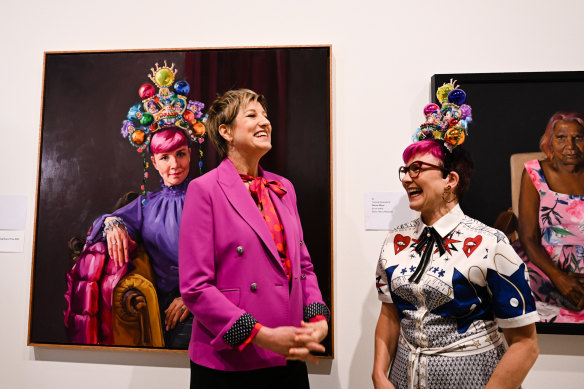 Winner of the Archibald Packing Room Prize Andrea Huelin with her sitter Cal Wilson in the Art Gallery of NSW on Thursday.