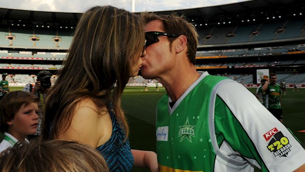 Warne and Liz Hurley at the MCG.