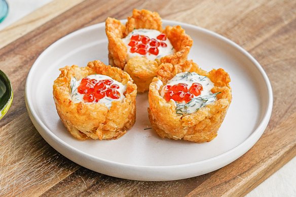 Crushed potato gem cups are a perfect vessel for caviar and creme fraiche.