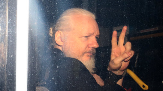 Assange in a police vehicle following his arrest at London’s Ecuadorian embassy in April. 