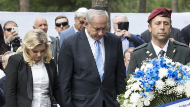 Israeli Prime Minister Benjamin Netanyahu and his wife his wife Sara Netanyahu at a commemoration ceremony of Holocaust victims at the Paneriai memorial near Vilnius, Lithuania, on Friday.
