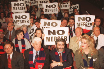 Melbourne supporters at an anti-merger meeting at Dallas Brooks Hall - Brian Dixon and Joseph Gutnick (right) are pictured at the front.  