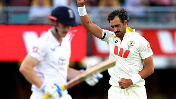 Mitchell Starc celebrates the wicket of Harry Brook.