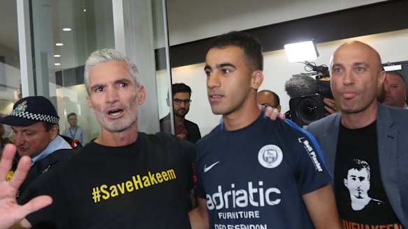 Craig Foster with refugee footballer Hakeem al-Araibi at Melbourne International Airport on February 12.