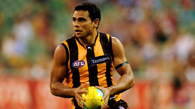 Cyril Rioli in full flight for the Hawks in 2012.