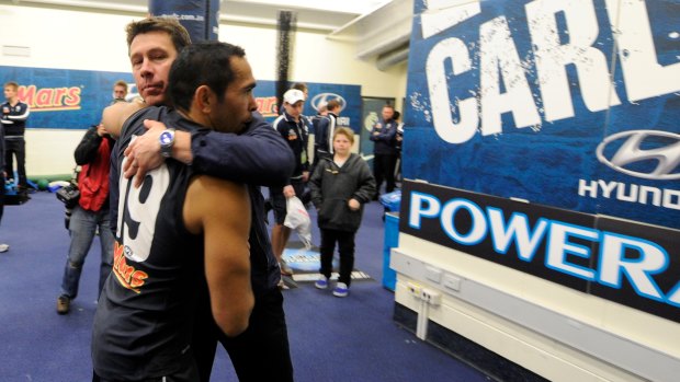 Then Carlton coach Brett Ratten embraces Betts after a match.