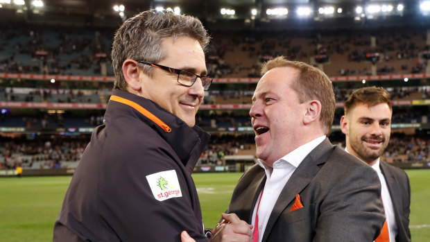 Leon Cameron and chief executive Dave Matthews celebrate Greater Western Sydney's gritty win.