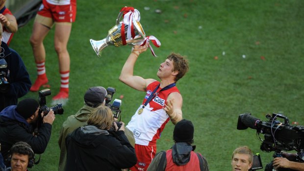 Triumph: Johnson following the 2012 grand final victory over Hawthorn.