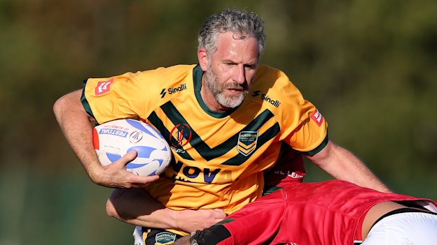 Adam Hills on the burst during the Physical Disability Rugby League World Cup in 2022.