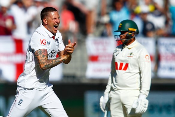 England’s Brydon Carse celebrates the wicket of Australia’s Usman Khawaja on day one in Perth.