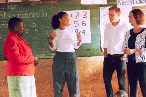 Evans, with former prime minister Julia Gillard and pop star Rihanna, an ambassador for The Global Partnership For Education, in Malawi in 2017.