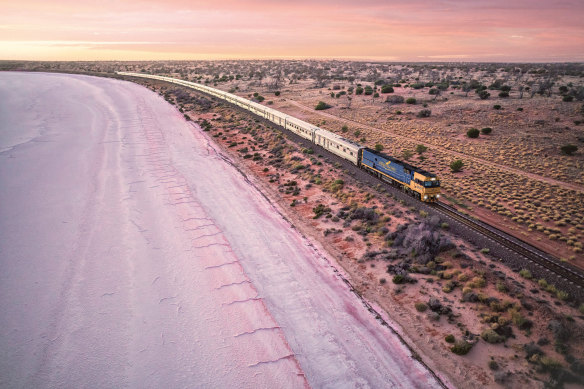 Indian Pacific glides past Lake Hart in South Australia.