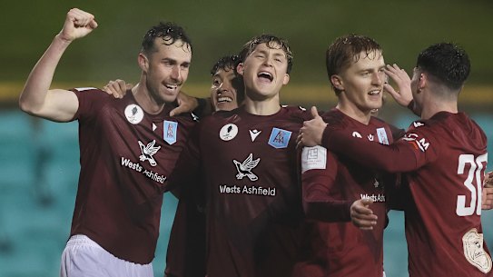 APIA Leichhardt players celebrate one of their goals against Melbourne City last week.