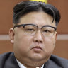 North Korea warns war inevitable, builds up spy satellites and nuclear arsenal
