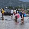 Australian Army soldiers from 51st Battalion, Far North Queensland Regiment, assist personnel from the Queensland Police Swift Water Rescue team and Surf Life Saving Queensland with recovery operations in Cairns’ Northern Beaches last week.