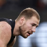 Carlton’s Harry McKay on all fours after copping a knock in the third quarter against North Melbourne.