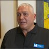 Mick Gatto wearing a shirt with an M Group logo in 2017.