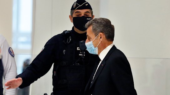 Former French president Nicolas Sarkozy arrives at the courtroom  in Paris on Monday.