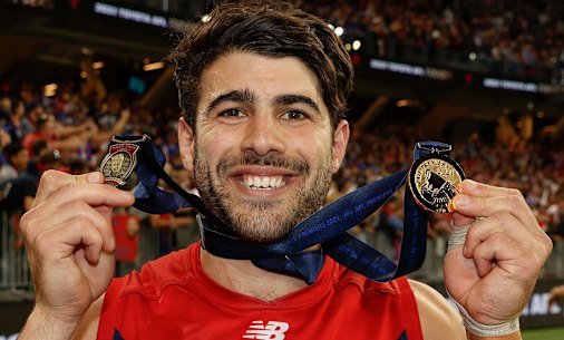 Christian Petracca with the Norm Smith and premiership medals