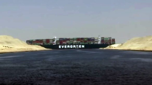 The Ever Given stuck in the Suez Canal. credit: Screengrab/BBC