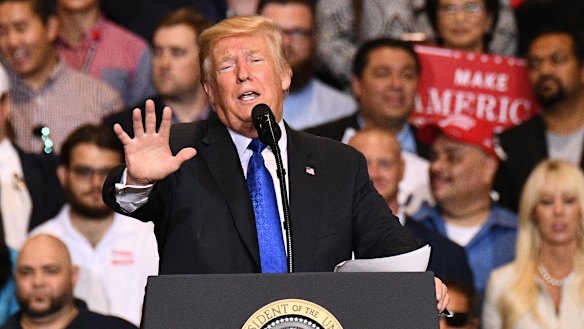 US President Donald Trump. The IMF said threats include a further inflaming of the trade war between the US and countries including China.