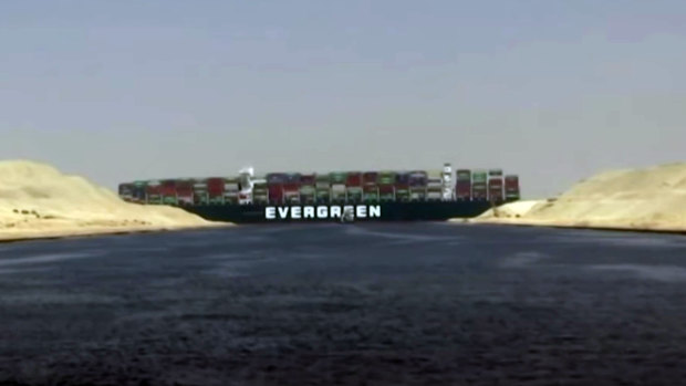 The Ever Given stuck in the Suez Canal. credit: Screengrab/BBC