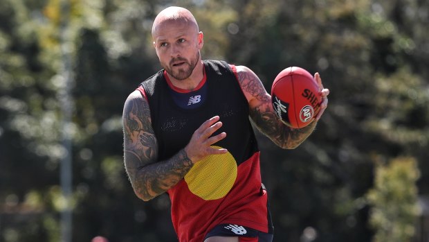 Nathan Jones makes a statement at training on Friday.