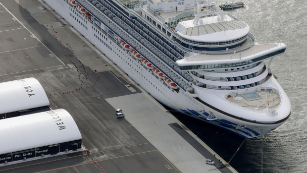 Quarantined: The cruise ship Diamond Princess is anchored at Yokohama Port, south of Tokyo.