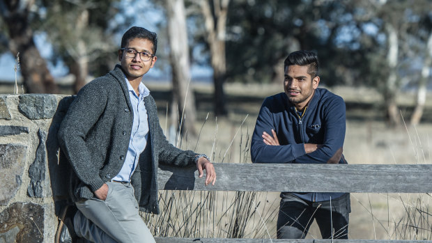 Chandan Paul, left,  of Bangladesh and Yatin Malik of India, who are among hundreds, if not thousands, of students who moved to the ACT in hopes of qualifying for permanent residency.