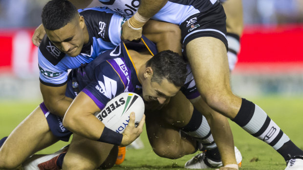 Idol: Valentine Holmes tackles Billy Slater earlier in the season.