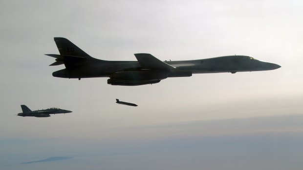 A US Air Force plane releases a Long Range Anti-Ship Missile (LRASM) during a test event. Australia is planning to buy 200 missiles to arm its air force.