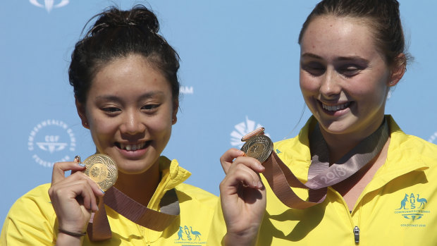 Australia's Esther Qin (left) and Georgia Sheehan show off their golds.