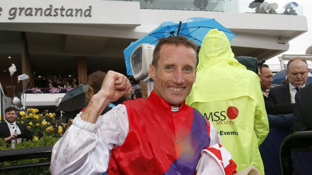 Damien Oliver's win on Warning was highlight of day one of the Flemington carnival.