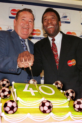 Strike force: Legends Pele, of Brazil and Just Fontaine, left, of France in 1998. Both were celebrating the 40th anniversary of the 1958 World Cup, won by Brazil. Fontaine scored a record 13 goals during the 1958 World Cup held in Sweden, and still holds the record for most goals scored in a single tournament.
