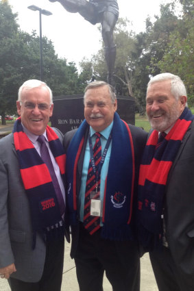 50-year member Peter Wolfe (right) standing with fellow member Mike Forehan (left) and AFL legend Ron Barassi (centre).