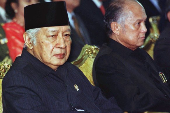 Indonesia’s late president Suharto (left) pictured in January 1998, four months before his resignation amid rioting in Jakarta and other cities.