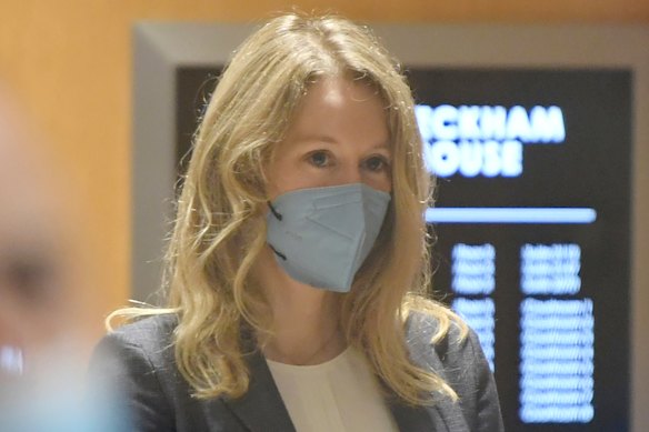 Elizabeth Holmes walks into the federal courthouse for her trial in San Jose, California on Wednesday.