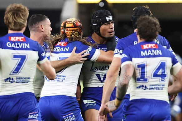 Canterbury celebrate the winning field goal by Stephen Crichton (centre).