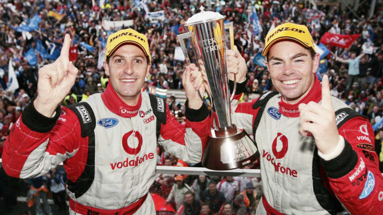 Craig Lowndes and Jamie Whincup celebrate their 2007 Bathurst win.