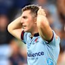 Waratahs Lawson Creighton and Angus Blyth hold their heads. How long will fickle Sydney rugby fans back the team?